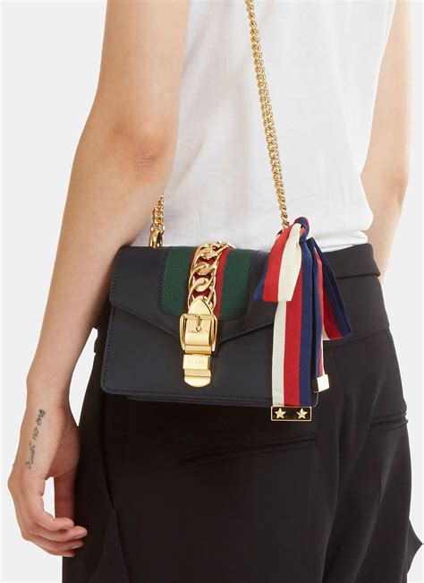 small solid navy gucci handbas|saks gucci mini bag.